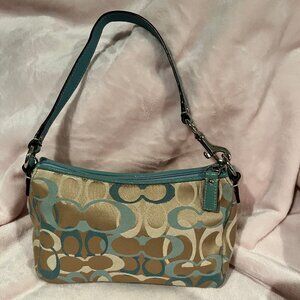 Stylish Tan and Turquoise Coach Handbag